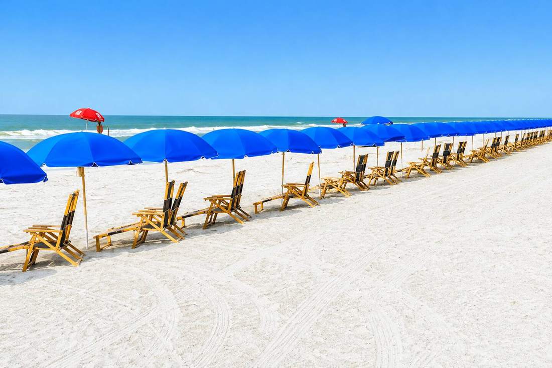 Folly Field beach with umbrellas and chairs a short walk from the condo